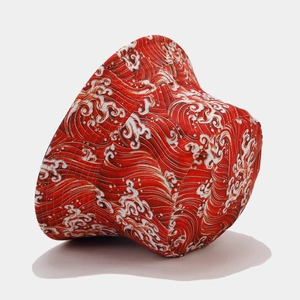 Cappello da pescatore rosso reversibile con stampa a onde bianche in tessuto di cotone