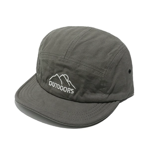 Detail showing the fine grid texture and white mountain embroidery on dark grey camper cap