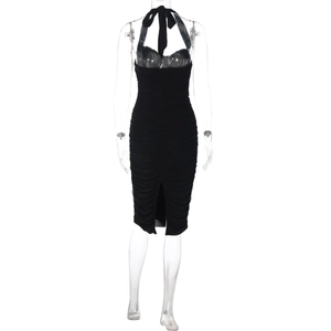 Back view of black halter ruched dress with backless design and center slit detail