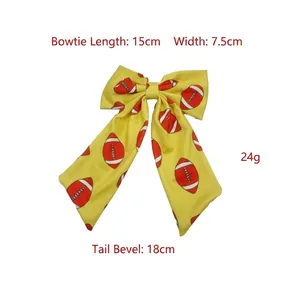 Yellow long tail bow hair clip with football print 15cm length for sports fans