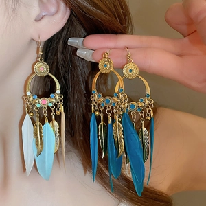 Bohemian feather drop earrings with vintage geometric pattern and golden leaf tassels