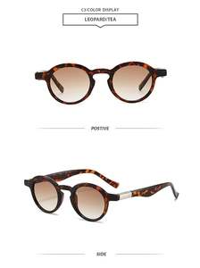 Detail of leopard print sunglasses with gradient tea lenses and metal hinge accents