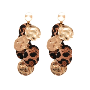 Vintage leopard print earrings with hammered gold metal discs in a bohemian drop style