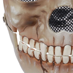 Close-up of weathered skull mask texture with realistic bone finish and metal eye mesh