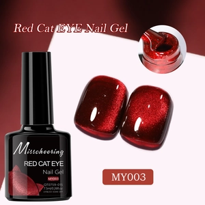 Macro detail of ruby red cat eye nail gel showing shimmering texture and 7.5ml bottle