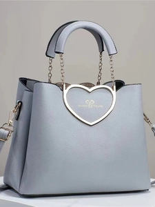 Light blue lychee texture handbag with heart-shaped metal buckle and long shoulder strap