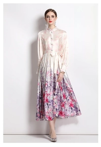 Detail of satin floral maxi dress with mandarin collar and elegant lantern sleeves