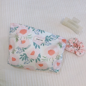 Floral cotton makeup bag with matching hair scrunchie featuring pink flower prints