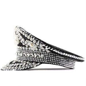 Black captain hat adorned with white pearls, rhinestones, and silver studs for festivals