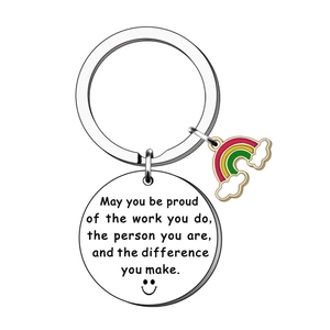 Stainless steel keychain with motivational circular pendant and colorful rainbow charm