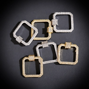 Close-up of square micro-pave zirconia connectors in gold and silver plating