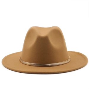 Detail of wool fedora hat with camel brown felt and golden snake chain metal band