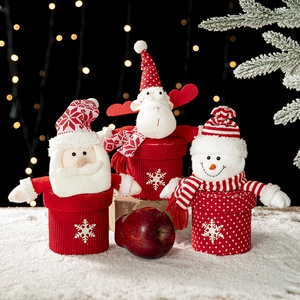 Christmas gift jars with Santa, Reindeer, and Snowman designs for festive decoration