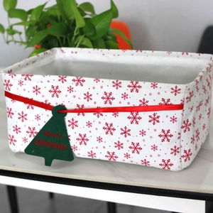 Rectangular Oxford cloth Christmas storage basket with red snowflakes and felt tree tag