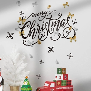 Merry Christmas wall decal with elegant black font and decorative bows on white wall