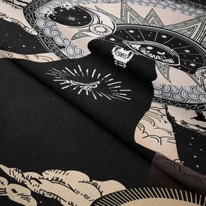 Close-up of Bohemian celestial tapestry showing thick fabric texture and sun moon patterns