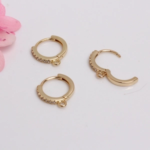 Close-up of 18k gold plated earring hooks with cubic zirconia for DIY jewelry making