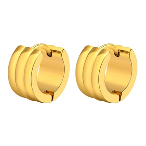 Chunky gold huggie earrings with triple ribbed texture and polished metallic finish