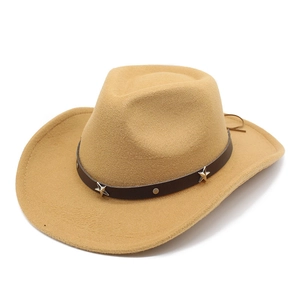 Detailed close-up of brown leather hatband with metal star rivets on felt cowboy hat