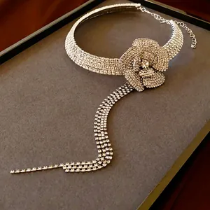 Elegant silver camellia flower choker with sparkling rhinestones and long tassels