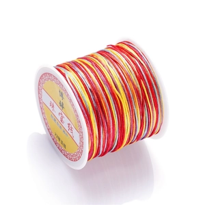 Macro detail of multicolored 72# gradient jade cord for DIY jewelry weaving and beading