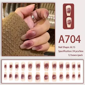 Press-on nails in dusty rose blush gradient with a glossy long coffin shape, model A704