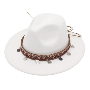 Detail of white felt fedora featuring ethnic woven band and silver coin pendants