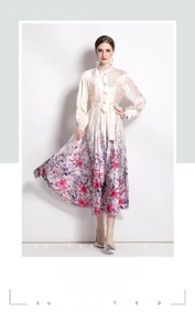 Detail of elegant satin floral dress with lantern sleeves and a belted waist design