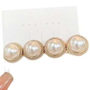 Elegant pearl hair clip with four large half-round pearls on gold textured metal base