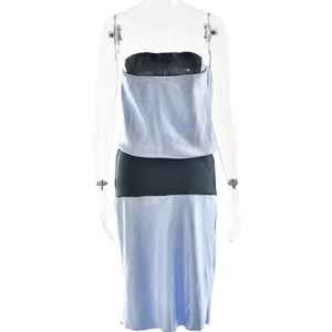 Rear view of a bodycon dress featuring light blue and dark grey satin patchwork design