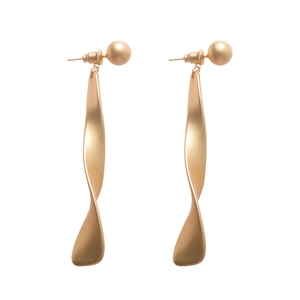 Gold twisted metal earrings with pearl accent on a clean white background