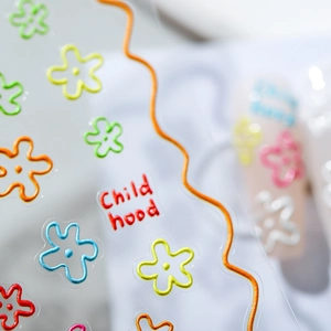 5D embossed nail stickers with colorful floral patterns and Childhood text design