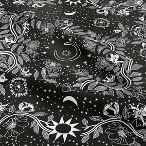 Detailed view of bohemian tapestry texture with sun moon and floral print design