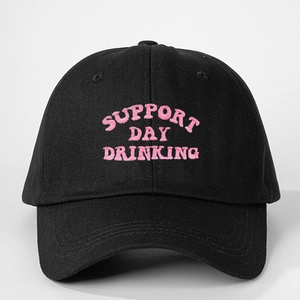 Black cotton baseball cap with pink Support Day Drinking embroidery on white background