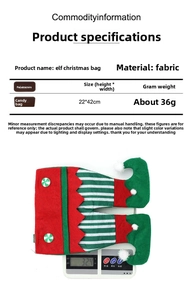 Detail showing elf Christmas candy bag dimensions 22x42cm and its lightweight fabric texture