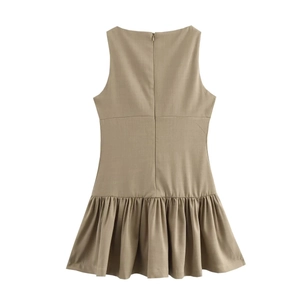 Detail of khaki sleeveless dress with back zipper and ruffled hem on white background