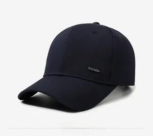 Detail view of the navy blue baseball cap showing textured fabric and Davia metal logo