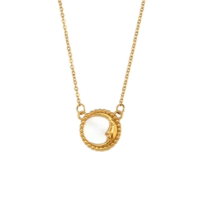 Golden crescent moon necklace with face detail and white shell inlay on white background