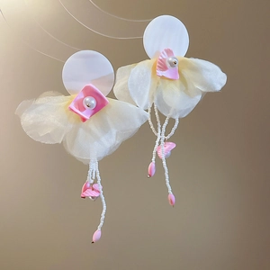 Detail of floral chiffon petal earrings with pearls and pink teardrop bead tassels