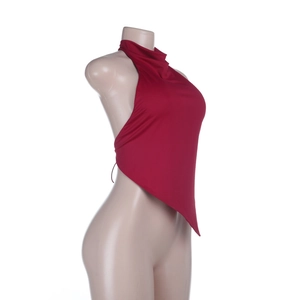 Detail view of red halter neck top with asymmetrical hem and open back on a mannequin