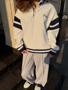 Grey half-zip sweatshirt and wide-leg joggers set with contrast stripes and embroidery