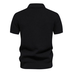 Detailed view of black polo shirt back with textured herringbone knit fabric