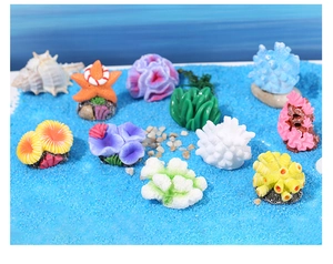 Detailed view of colorful resin coral and starfish ornaments for fish tank landscape