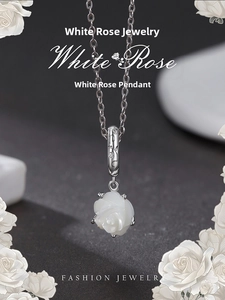 Detailed close-up of a white rose pendant crafted in S925 silver with elegant petal carving