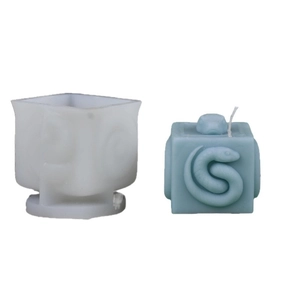 Square silicone mold for DIY candles featuring a 3D snake relief and translucent white finish