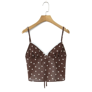 Detail of coffee brown polka dot camisole with white lace trim and bow knot