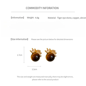 Détail des boucles d'oreilles étoile en oeil de tigre avec dimensions et matériaux