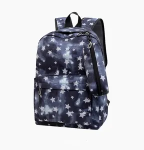 Detail view of starry sky print backpack and matching zipper pouch in navy blue