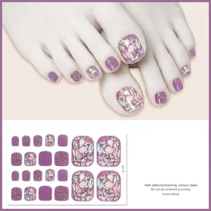 Detail showing J23-01 purple glitter toe nail patches with marble textures and self-adhesive