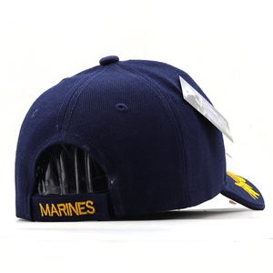Detail of navy blue cotton cap with yellow Marines embroidery on adjustable back strap